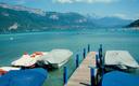 View over alpine lake from the quaint town of Annecy near the French-Swiss border.